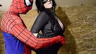 Busty Cosplay Catwoman takes spiderman web
