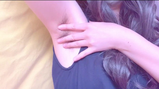A Asian home-made in a tank top just strokes her armpit hair [amateurs]